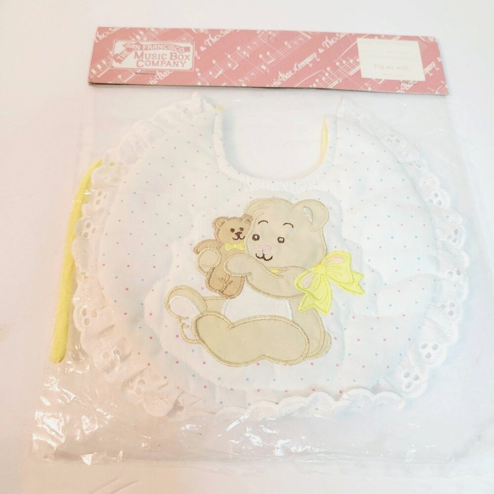 Vtg NOS It's a Small World Music Box Company Teddy Bear Embroider Baby Bib WORKS